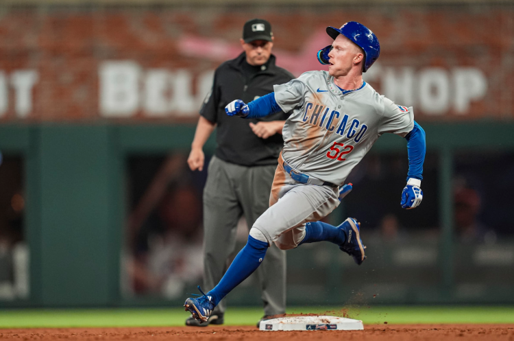 May 15, 2024; Cumberland, Georgia, USA; Chicago Cubs center fielder Pete Crow-Armstrong (52) runs after hitting a triple against the Atlanta Braves during the eight inning at Truist Park. Photo: Dale Zanine/USA TODAY Sports