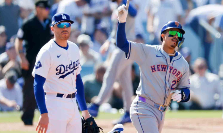 Mark Vientos of the New York Mets rounds first after hitting a grand slam during the second inning in Game 2 of the National League Championship Series against the Los Angeles Dodgers at Dodger Stadium on Monday, Oct. 14, 2024. Gina Ferazzi / Los Angeles Times via Getty Images