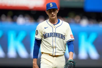George Kirby walking off the mound looking dejected